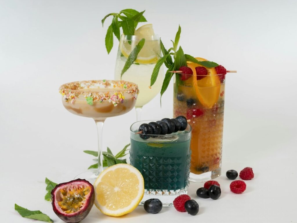 A classic margarita cocktail with salted rim and lime wedge on a wooden table, cocktail recipes NZ style